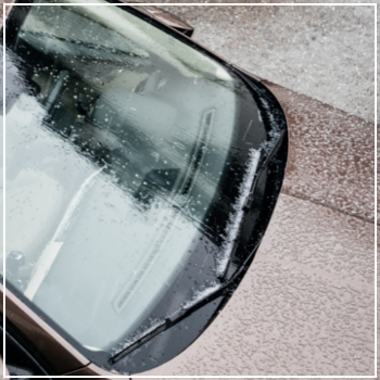 car being struck with hail