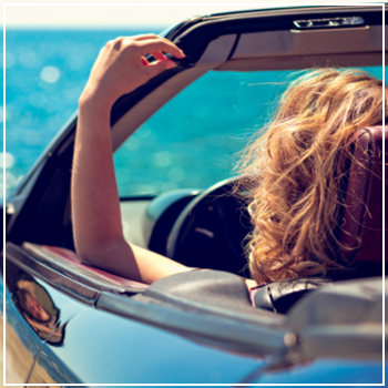 woman parked at the beach