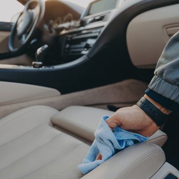 cleaning car interior passenger seat