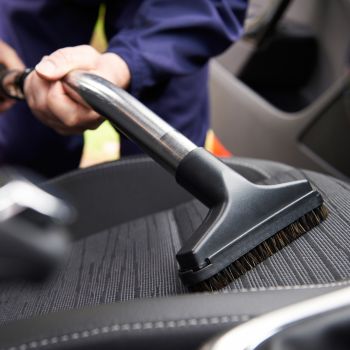 vacuuming seat of car